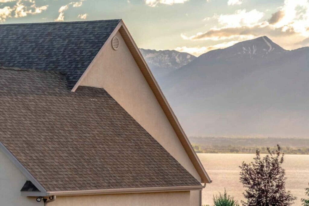 roof valley on a home set within the mountains