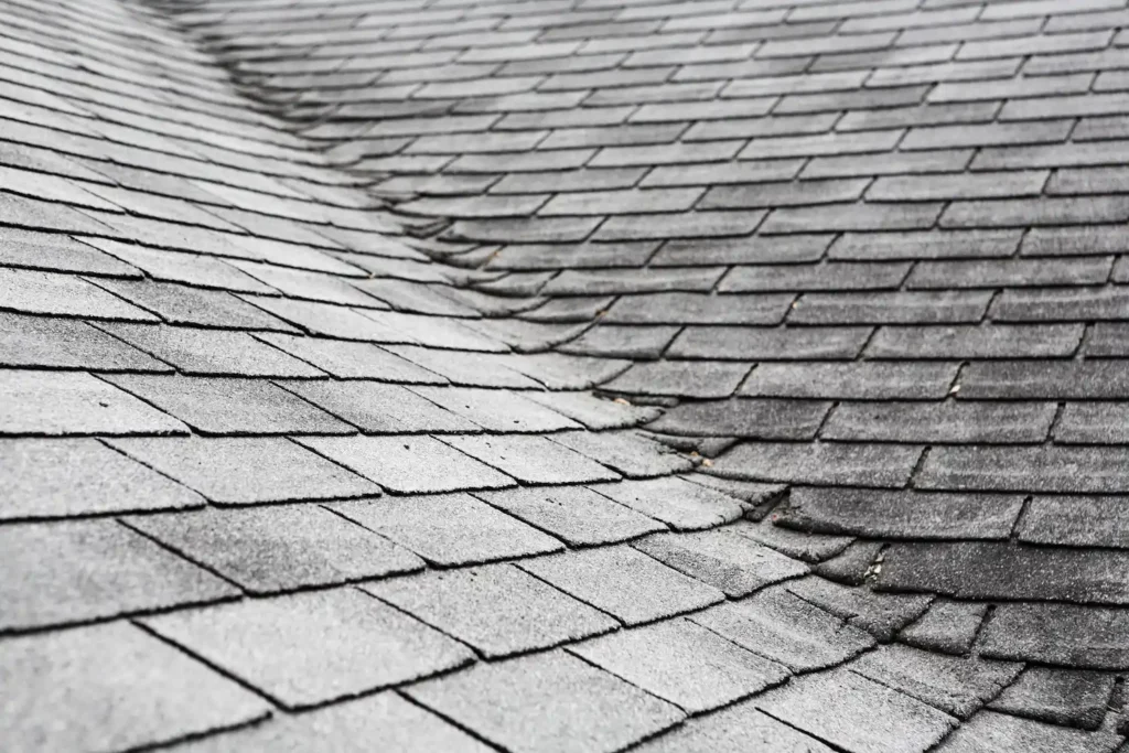 removing shingles from roof chipped and cracked shingle